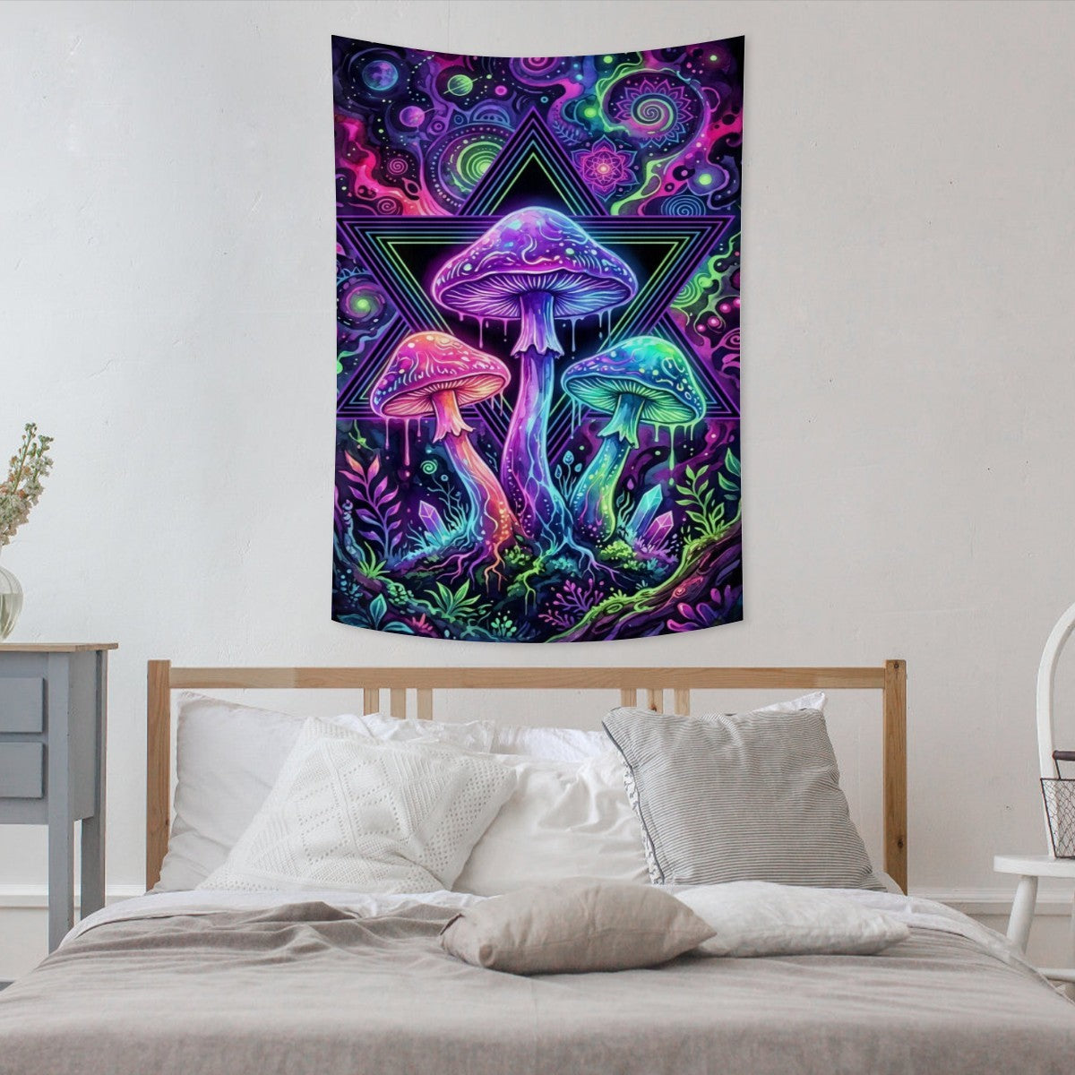 A colorful wall tapestry featuring psychedelic mushrooms and a Star of David, hanging on a bedroom wall above a bed.