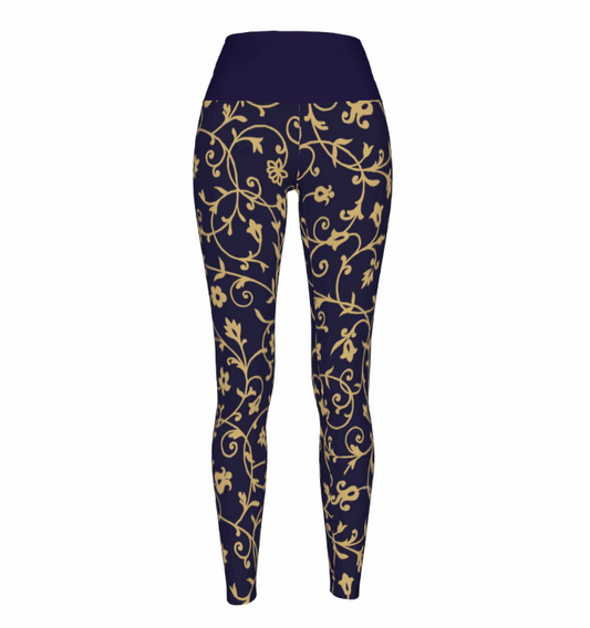 A pair of women's high waist stretchy leggings featuring a golden vine pattern on a white background.