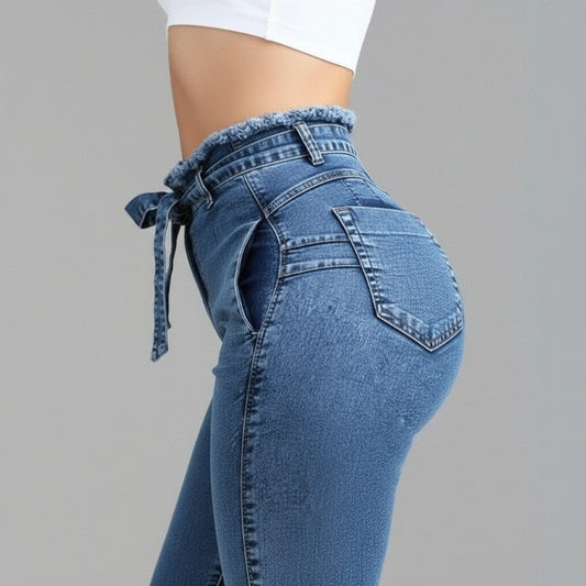 Blue jeans with a tie-waist design on a gray background