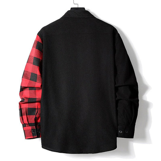Shirt with a black body and contrasting red and black checkered left sleeve hanging on a hanger