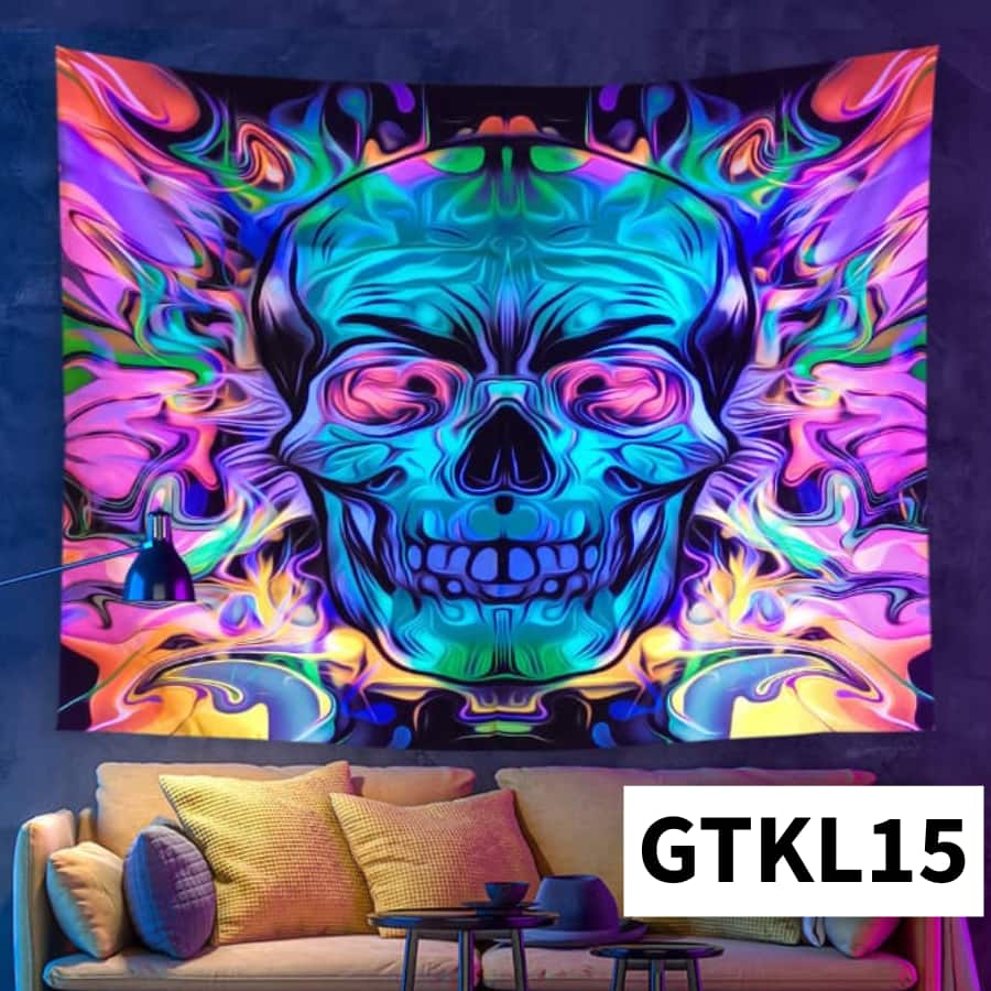 Colorful skull tapestry hanging on a wall above a sofa with 'GTKL15' label.