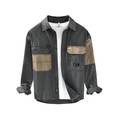 A men's button-up shirt with large 2-color contrast chest pockets, featuring a grey body with a beige collar and pocket accents.