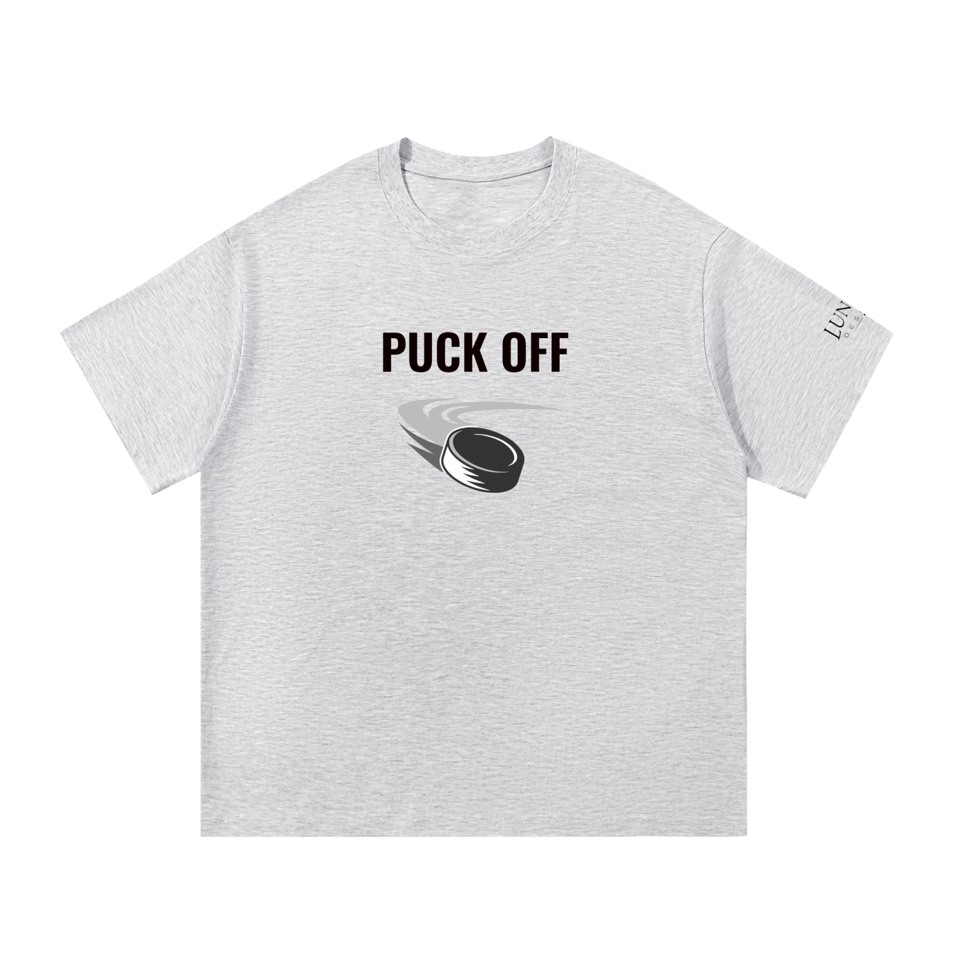 A light heather gray short-sleeve t-shirt with 'PUCK OFF' printed in black block letters above a black and gray hockey puck graphic on the chest. A small black graphic is visible on the right sleeve.