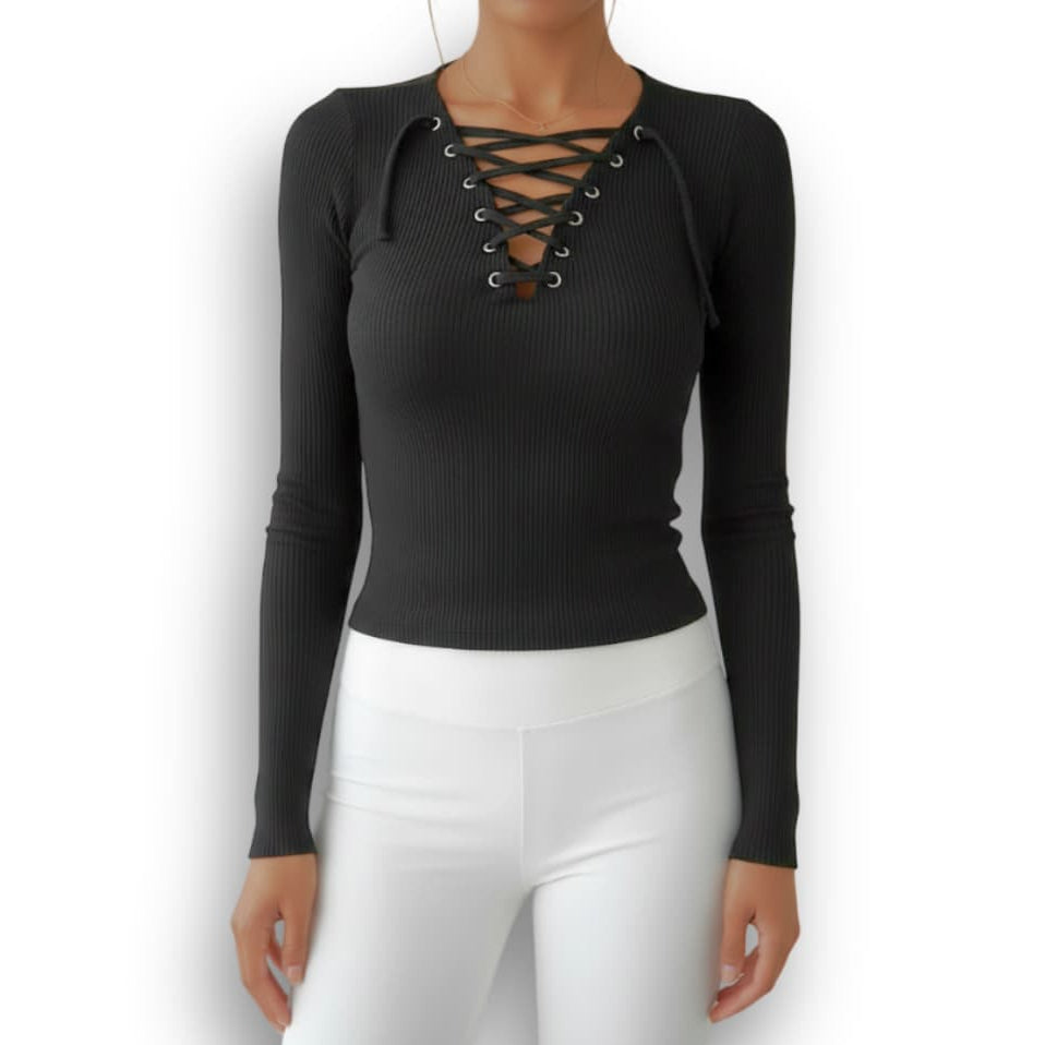 Black long-sleeve top with lace-up detail worn by a person on a white background