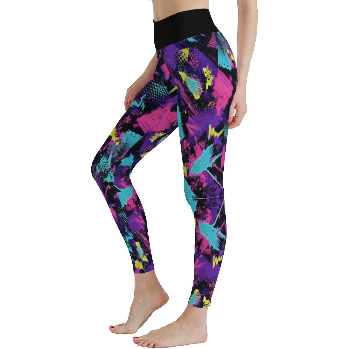 A model wearing high-waisted leggings with a vibrant abstract geometric print in purple, pink, teal, and yellow on a black base, shown against a plain white background.