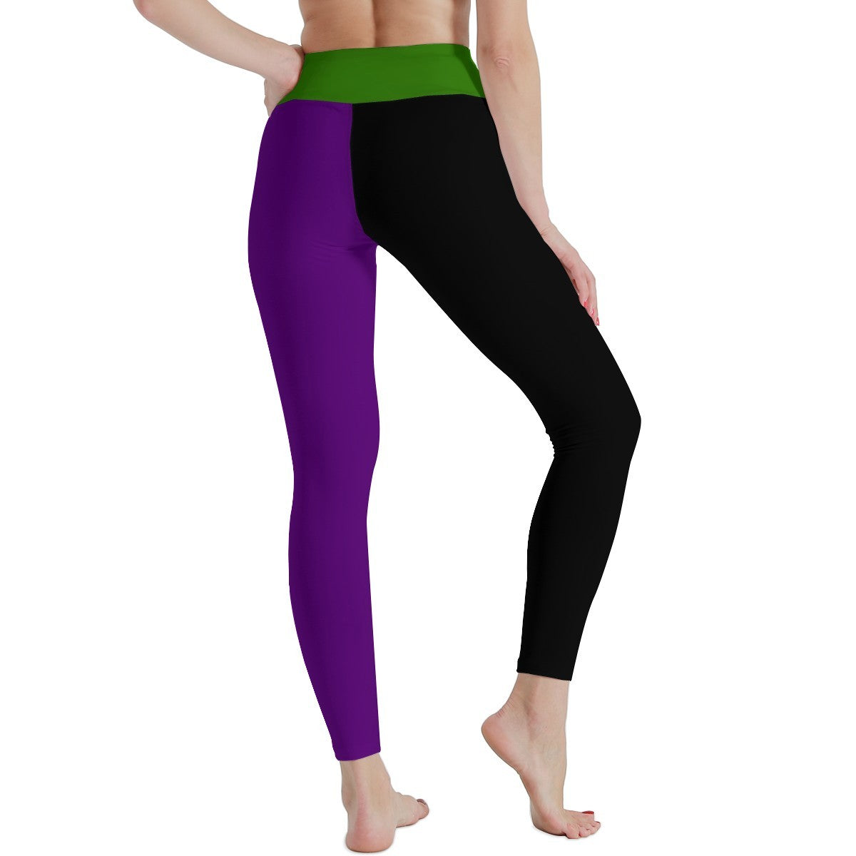 Color-blocked leggings with purple, green, and black sections on a white background