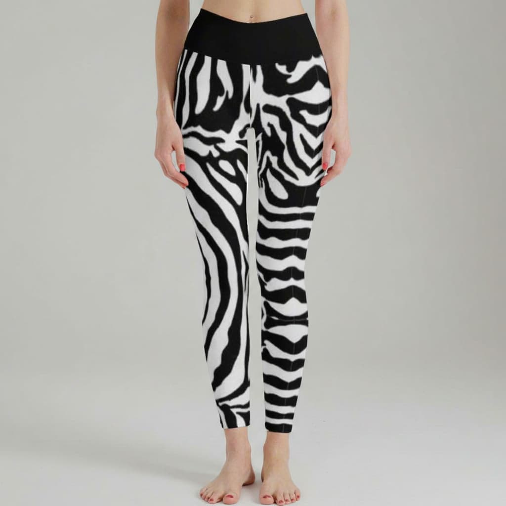 a woman wearing zebra striped leggings