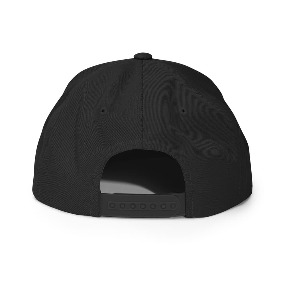 Back of a black snapback cap on a white background