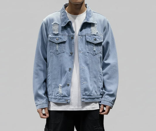 Light blue denim jacket worn by a person on a gray background
