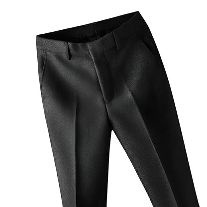 Black pants on a light gray background