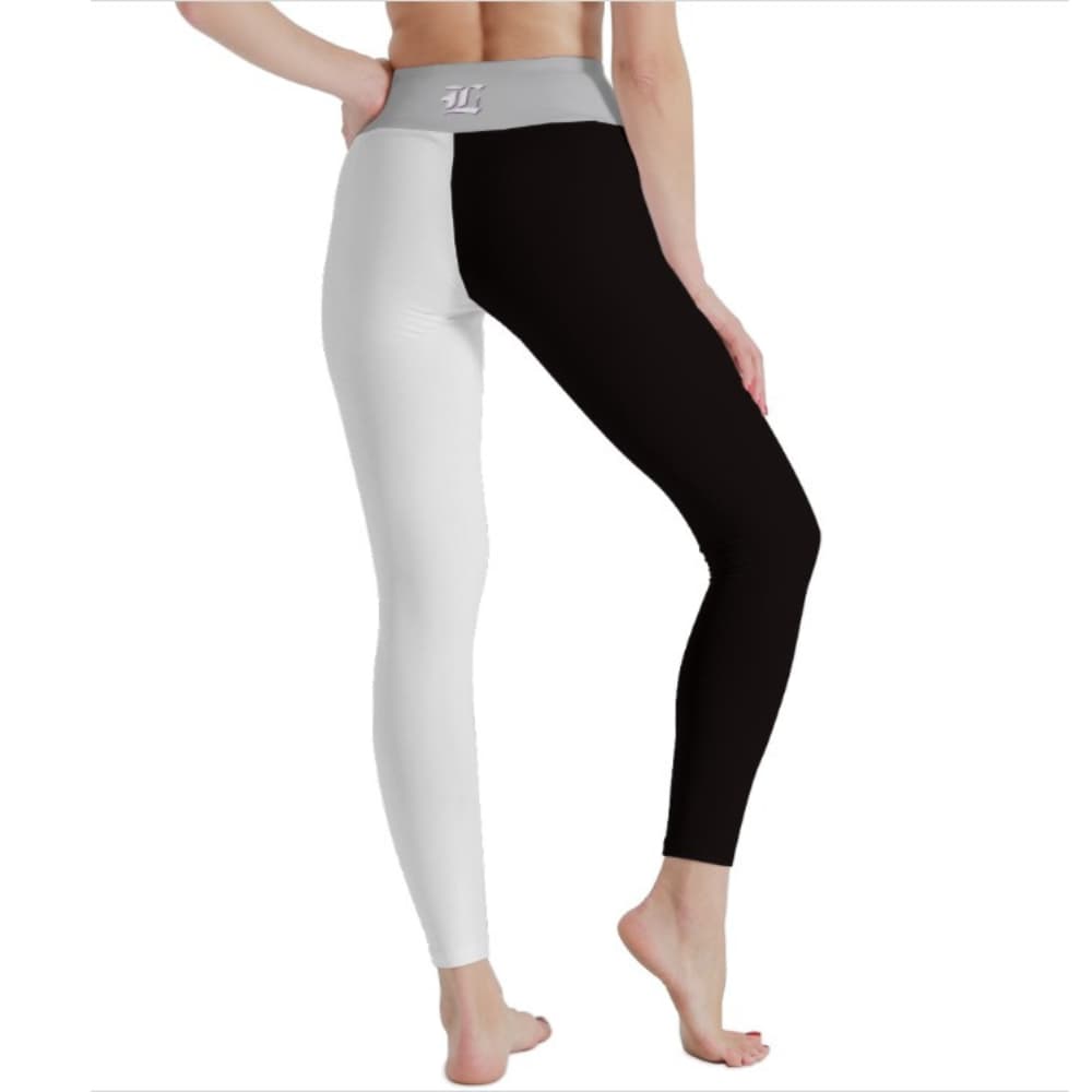 White and black leggings with a gray waistband on a white background